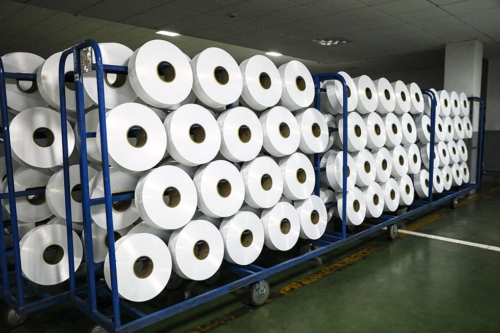 Cómo los agentes engrasante dan forma a Nylon 6 Poy Rendimiento en texturas, tejer y más allá
